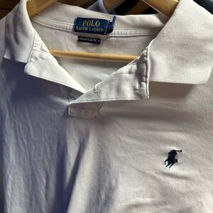 Two Ralph Lauren polo shirts one with huge polo horse other is slim fit xxl